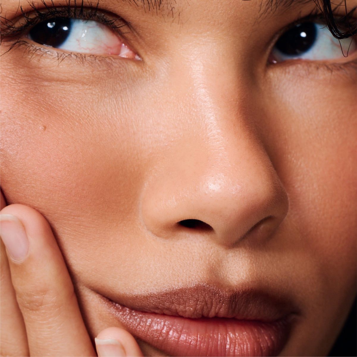model wears peptide lip shape in stretch